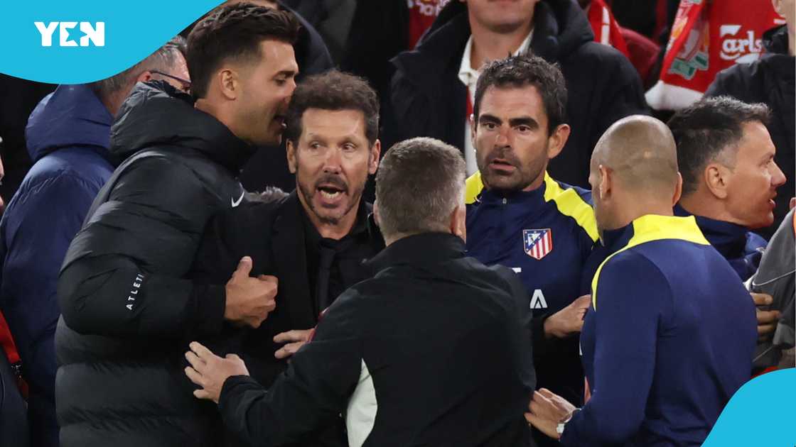 Diego Simeone Held Back by Security After Heated Moment With Liverpool Fans Diego Simeone Held Back by Security After Heated Moment With Liverpool Fans