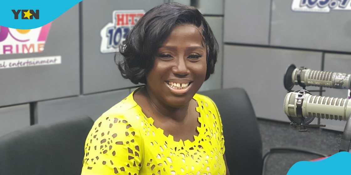 Gospel musician Diana Hamilton in a yellow dress Gospel musician Diana Hamilton in a yellow dress