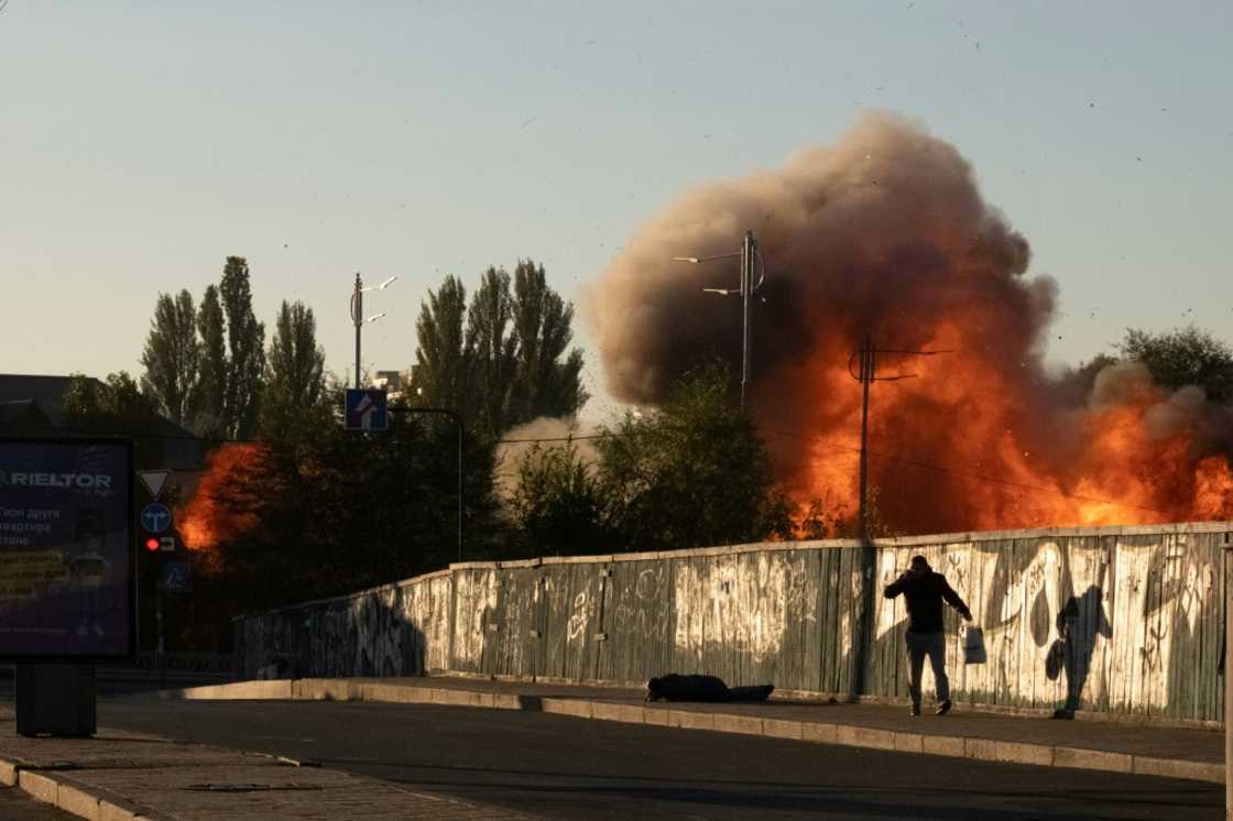 Kyiv officials say kamikaze drones killed at least four people early on Monday