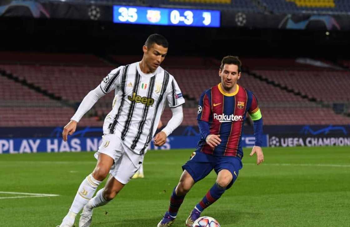 Cristiano Ronaldo and Messi in action