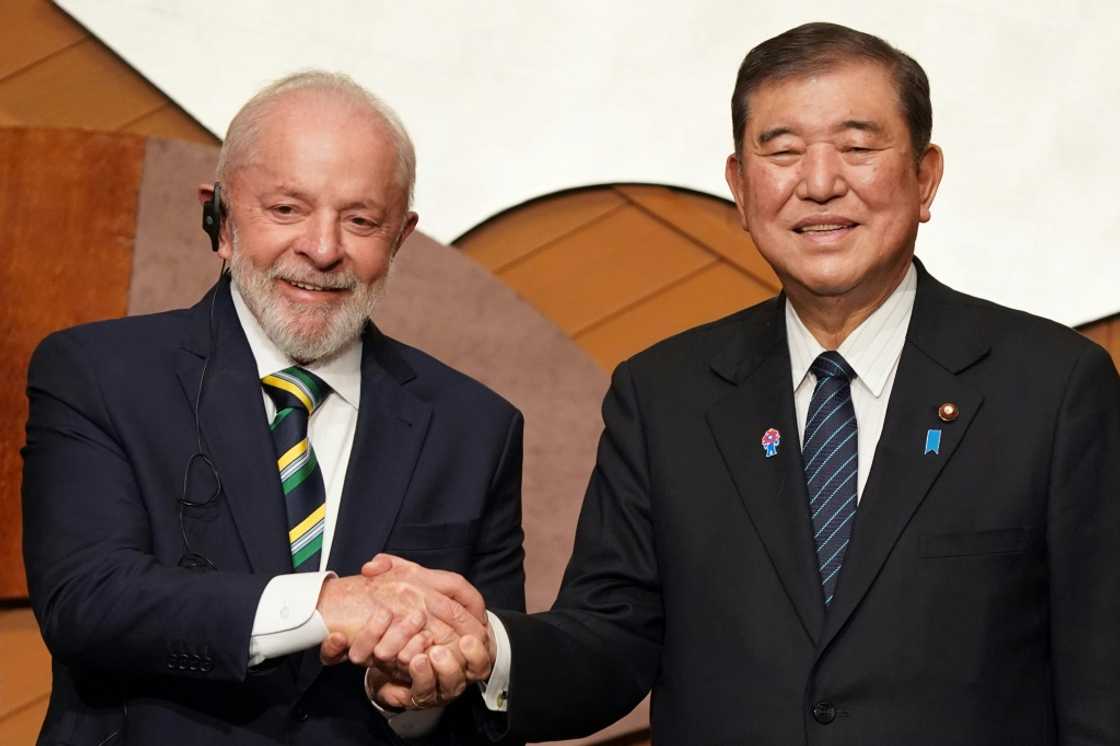 Brazilian President Luiz Inacio Lula da Silva (L) said his country and Japan had ' more to gain from integration than from protectionist practices' Brazilian President Luiz Inacio Lula da Silva (L) said his country and Japan had ' more to gain from integration than from protectionist practices'