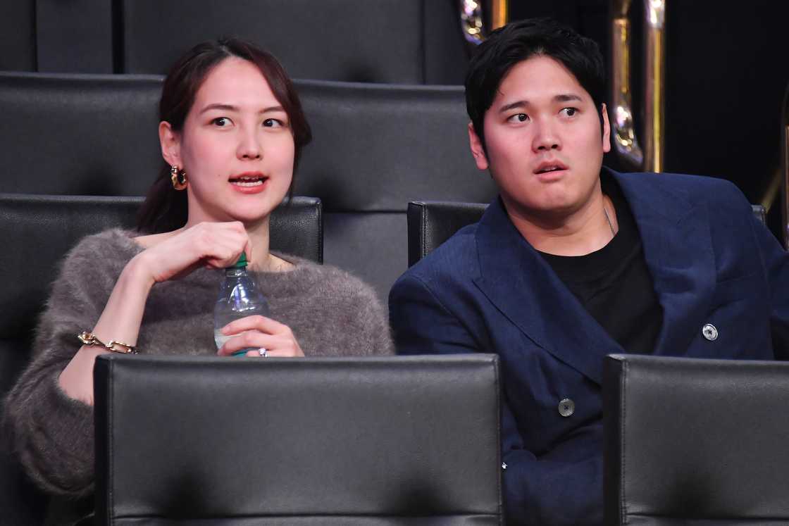 Mamiko Tanaka and Shohei Ohtani attend a basketball game between the Los Angeles Lakers and Portland Trailblazers