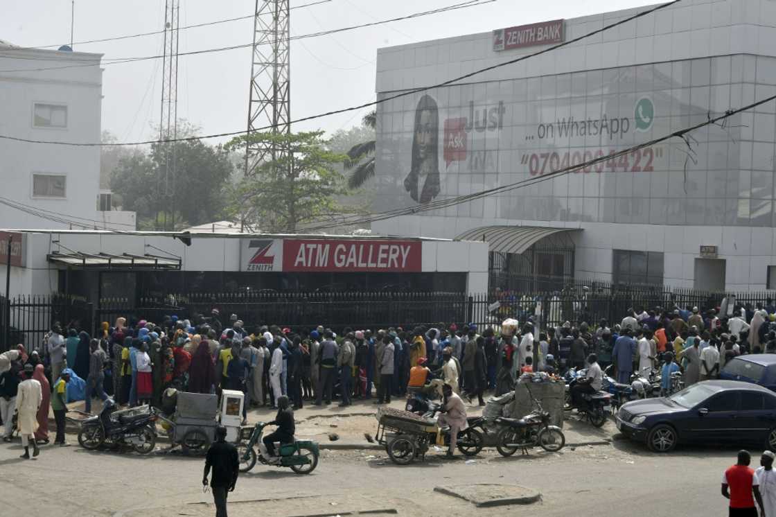 Cash shortages in Nigeria have created long lines outside banks and ATMS as customers try to get their hands on bank notes Cash shortages in Nigeria have created long lines outside banks and ATMS as customers try to get their hands on bank notes