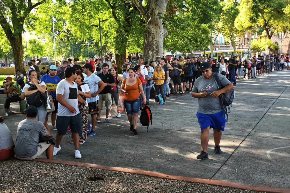 Argentines queue for buses amid a rail strike Argentines queue for buses amid a rail strike