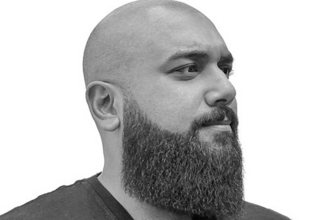 A man with a square tapered long beard A man with a square tapered long beard