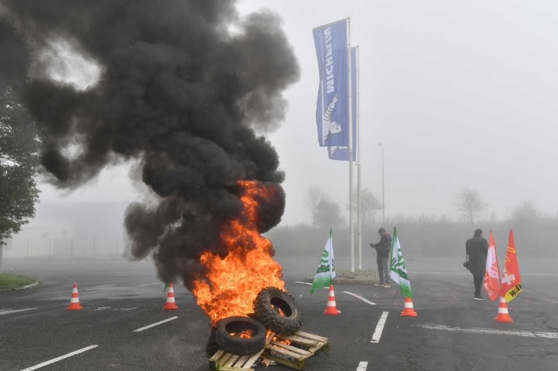 Tyres were set on fire as workers rallied outside the Michelin plant in Cholet Tyres were set on fire as workers rallied outside the Michelin plant in Cholet