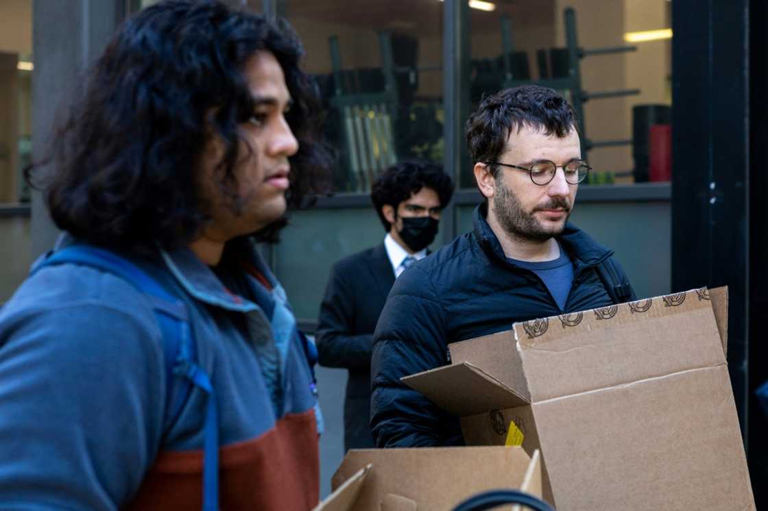 Rahul Ligma(L), software engineer, and Daniel Johnson speak with the media outside Twitter headquarters after allegedly being laid off on October 28, 2022, in San Francisco, California Rahul Ligma(L), software engineer, and Daniel Johnson speak with the media outside Twitter headquarters after allegedly being laid off on October 28, 2022, in San Francisco, California