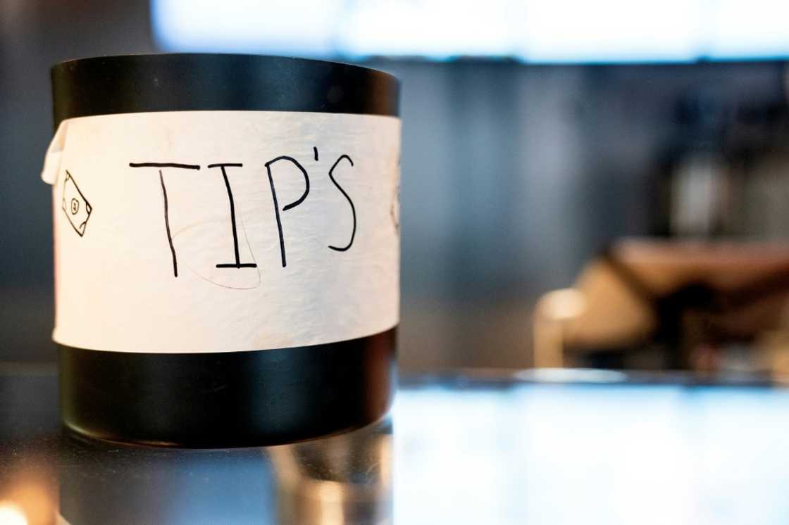 A tip jar on a countertop seems kind of quaint these days at US businesses A tip jar on a countertop seems kind of quaint these days at US businesses