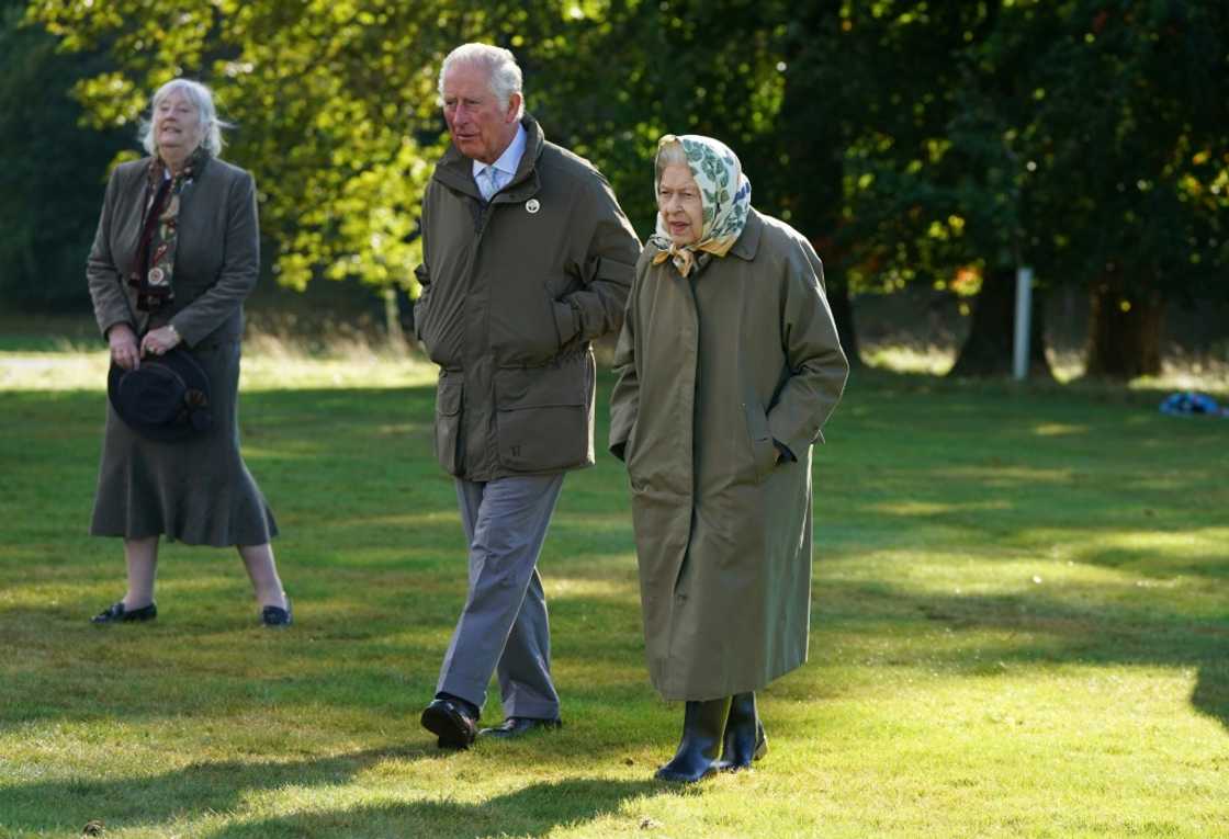 The queen and the then Prince Charles strolling through the grounds at Balmoral last year The queen and the then Prince Charles strolling through the grounds at Balmoral last year