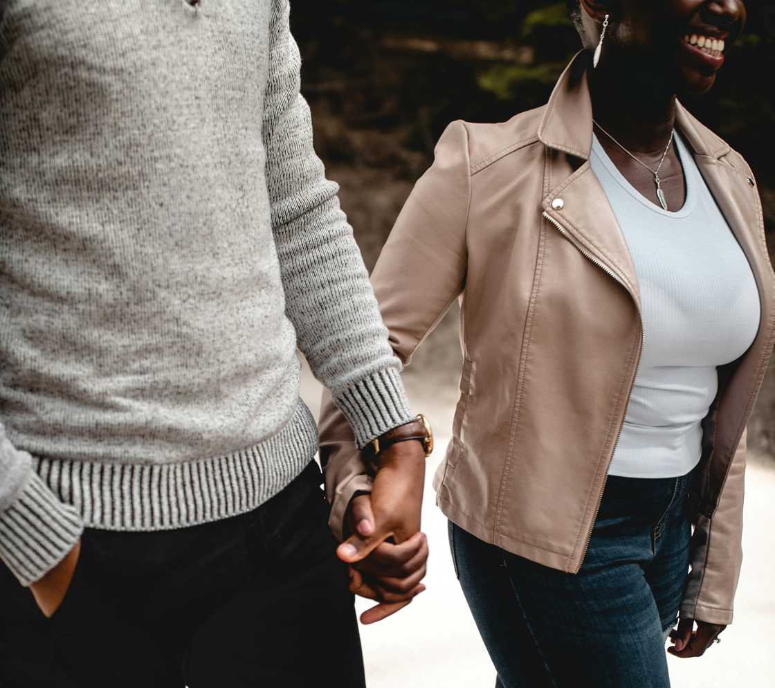 A couple holding hands A couple holding hands