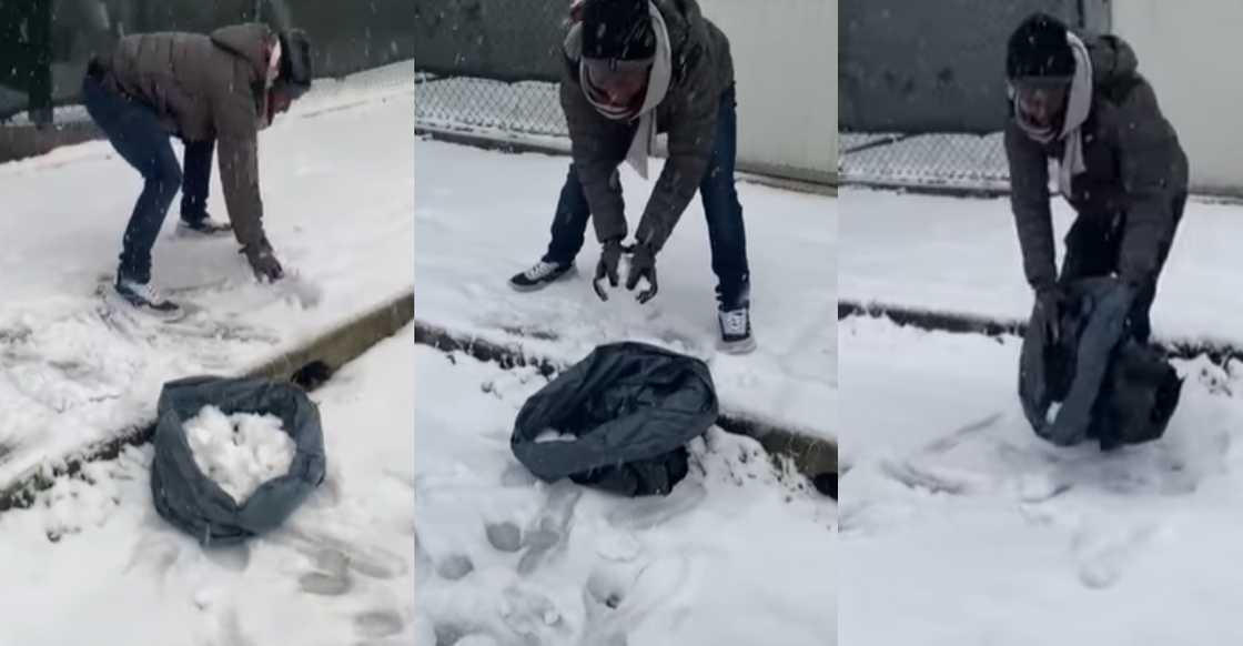 Ghanaian man seen picking up snow into disposable rubber