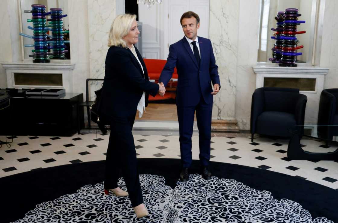 French President Emmanuel Macron is hosting rare talks at the Elysee with opposition leaders, including far-right leader Marine Le Pen French President Emmanuel Macron is hosting rare talks at the Elysee with opposition leaders, including far-right leader Marine Le Pen