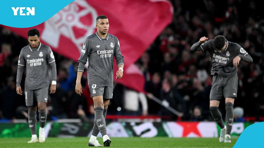 Real Madrid players looked dejected after conceding three goals against Arsenal. Real Madrid players looked dejected after conceding three goals against Arsenal.