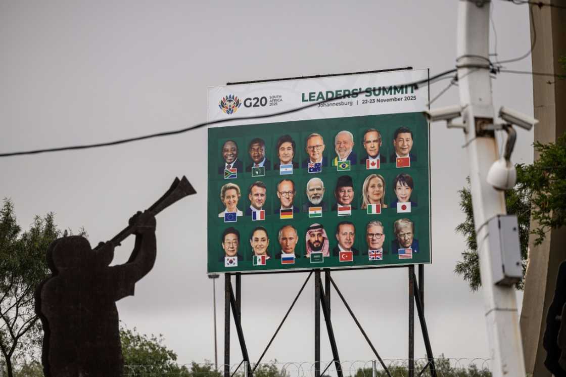 A billboard shows the heads of states of the G20 countries head of this weekend's summit A billboard shows the heads of states of the G20 countries head of this weekend's summit
