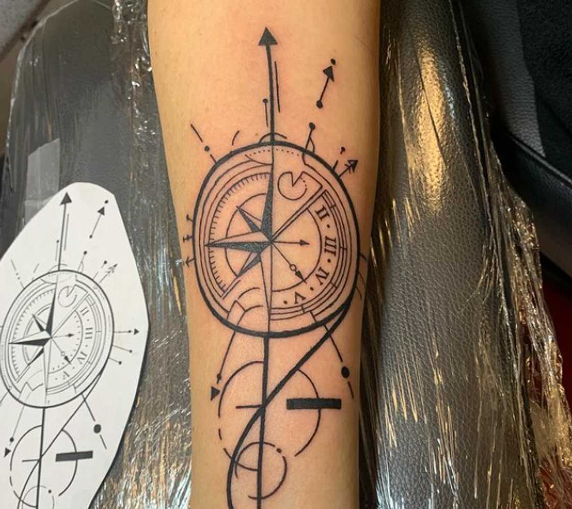 Four seasons arrow compass tattoo