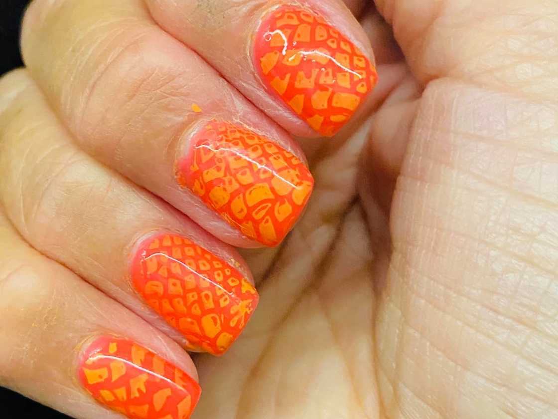 Geometrical orange nail art Geometrical orange nail art