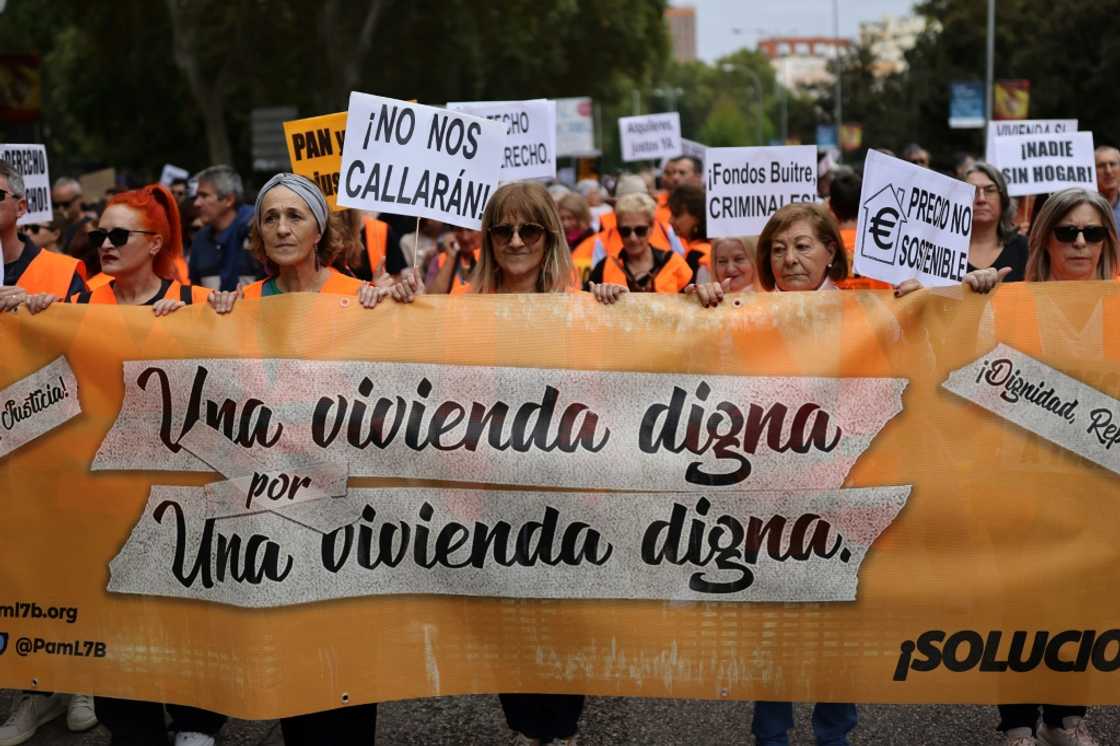 Around 22,000 protesters thronged central Madrid on Sunday to vent their anger at the housing crisis