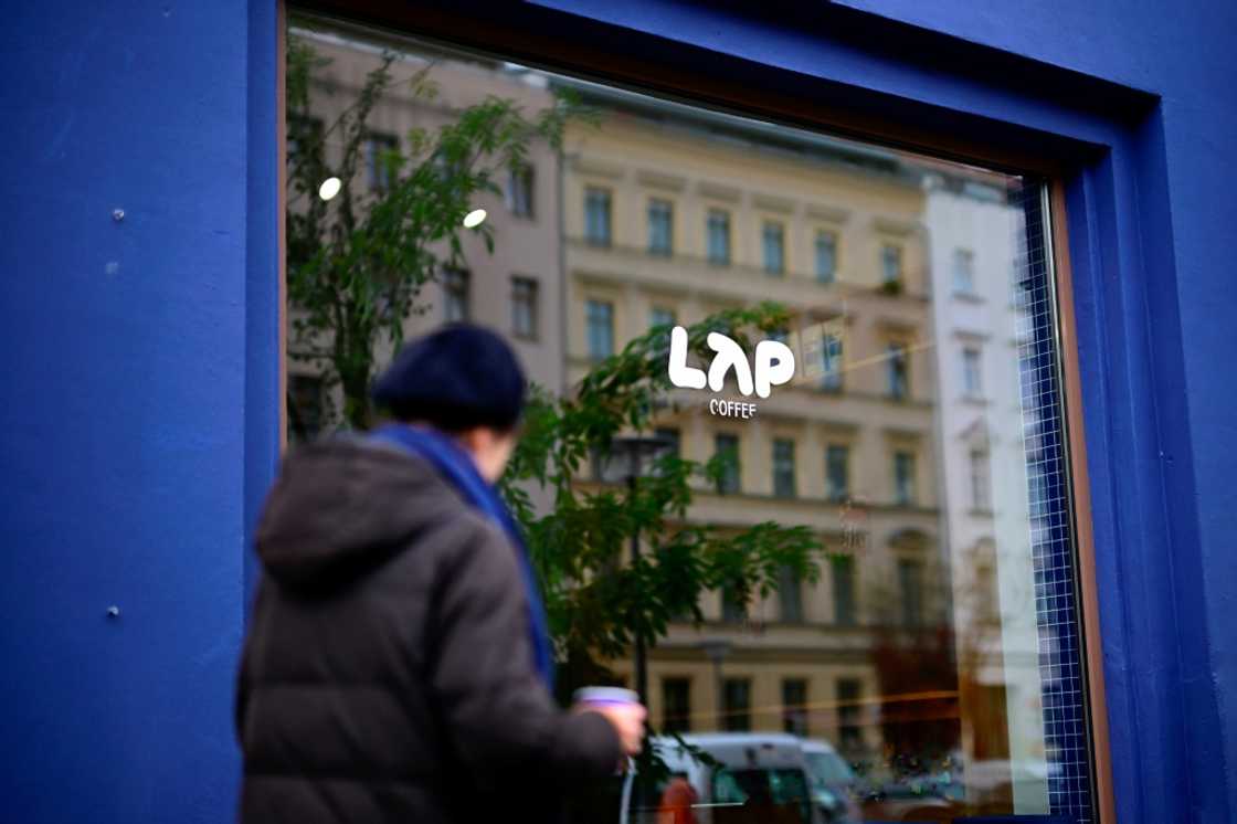 The coffee chain LAP is known for its electric blue shop fronts and minimalist design The coffee chain LAP is known for its electric blue shop fronts and minimalist design