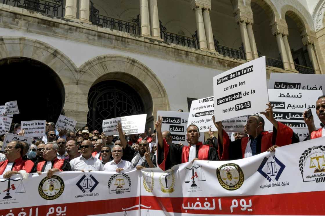 Judges gather for a protest against Tunisia's President Kais Saied outside the Tunis Palace of Justice in Tunisia's capital on June 23 Judges gather for a protest against Tunisia's President Kais Saied outside the Tunis Palace of Justice in Tunisia's capital on June 23