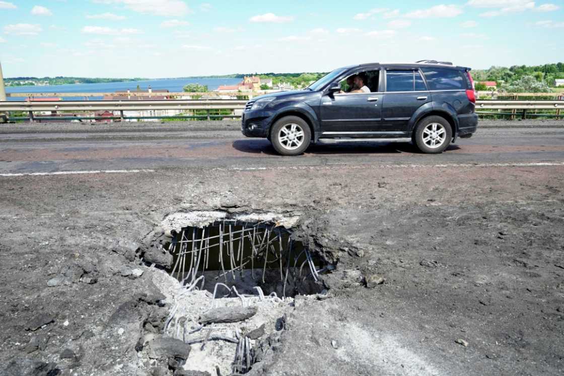 The Antonivskiy bridge, pictured on July 21, spans the Dnipro river The Antonivskiy bridge, pictured on July 21, spans the Dnipro river