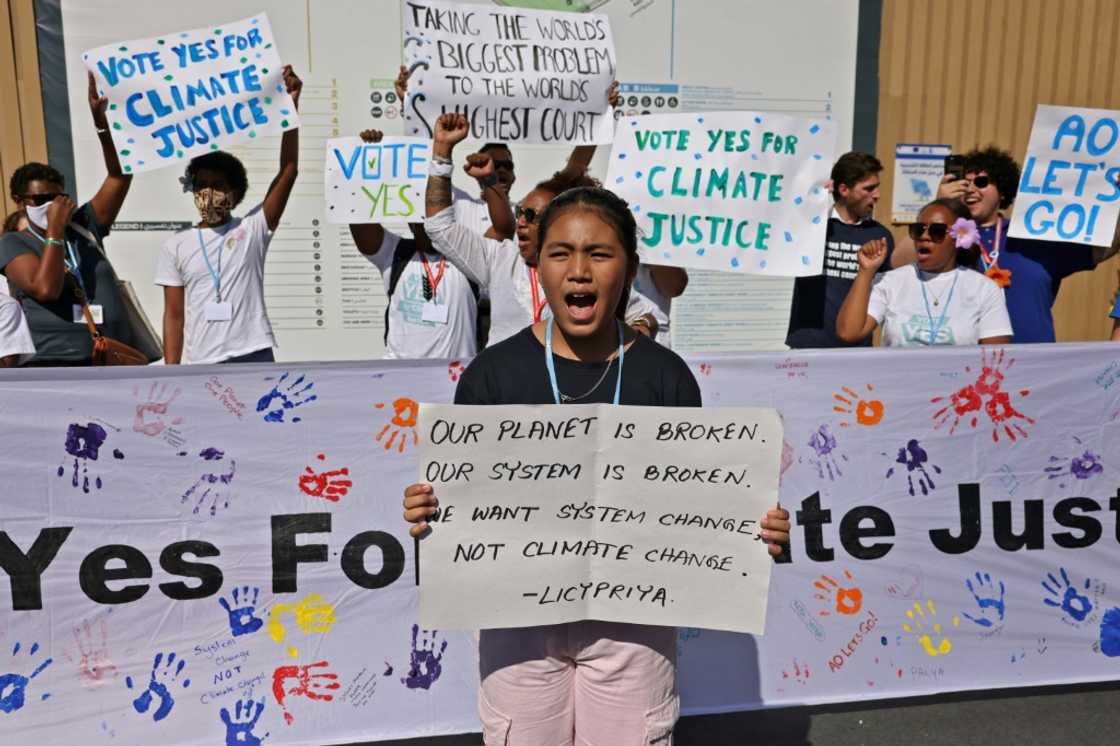 Members of the activist group Pacific Island Students Fighting Climate Change (PISFCC) stage a protest during the COP27 climate conference in the Egyptian restort town of Sharm el-Sheikh Members of the activist group Pacific Island Students Fighting Climate Change (PISFCC) stage a protest during the COP27 climate conference in the Egyptian restort town of Sharm el-Sheikh