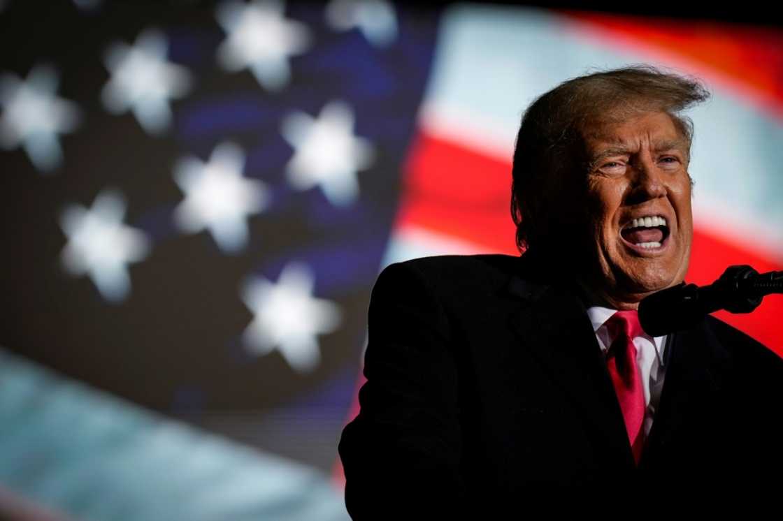 Former US president Donald Trump speaks during a rally at the Dayton International Airport on November 7, 2022 in Vandalia, Ohio, saying he will make a major announcement on November 15