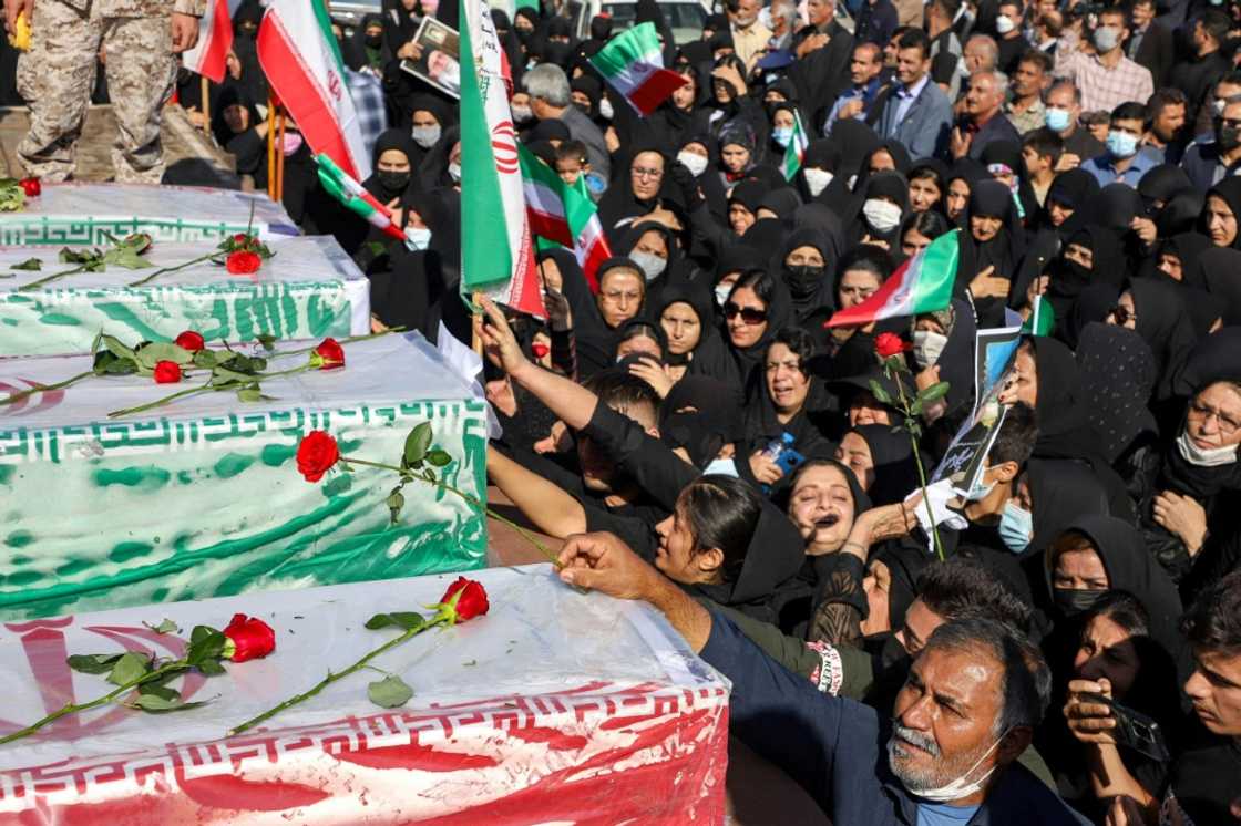 Iranians take part in a funeral in Izeh, a city in the country's southwest Iranians take part in a funeral in Izeh, a city in the country's southwest