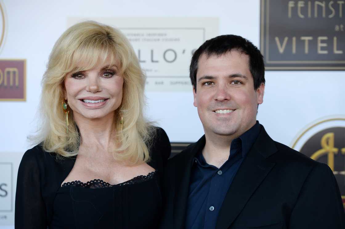 Loni Anderson and her son Quinton Anderson Reynolds arrive at the debut of the Southern California location of Michael Feinstein's new supper club Feinstein's Loni Anderson and her son Quinton Anderson Reynolds arrive at the debut of the Southern California location of Michael Feinstein's new supper club Feinstein's