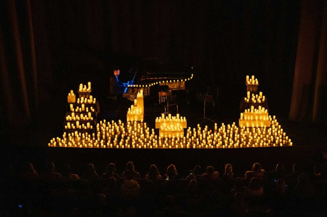 In a bid to boost the mood in Kyiv and save power, musicians play a classical concert with hundreds of LED candles lighting up the stage In a bid to boost the mood in Kyiv and save power, musicians play a classical concert with hundreds of LED candles lighting up the stage
