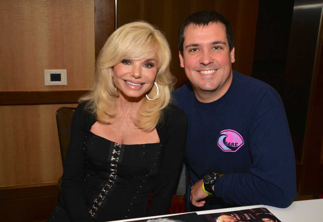 Loni Anderson and her son Quinton Anderson Reynolds at the Spooky Empire Horror Convention at the Hyatt Regency in Orlando Loni Anderson and her son Quinton Anderson Reynolds at the Spooky Empire Horror Convention at the Hyatt Regency in Orlando