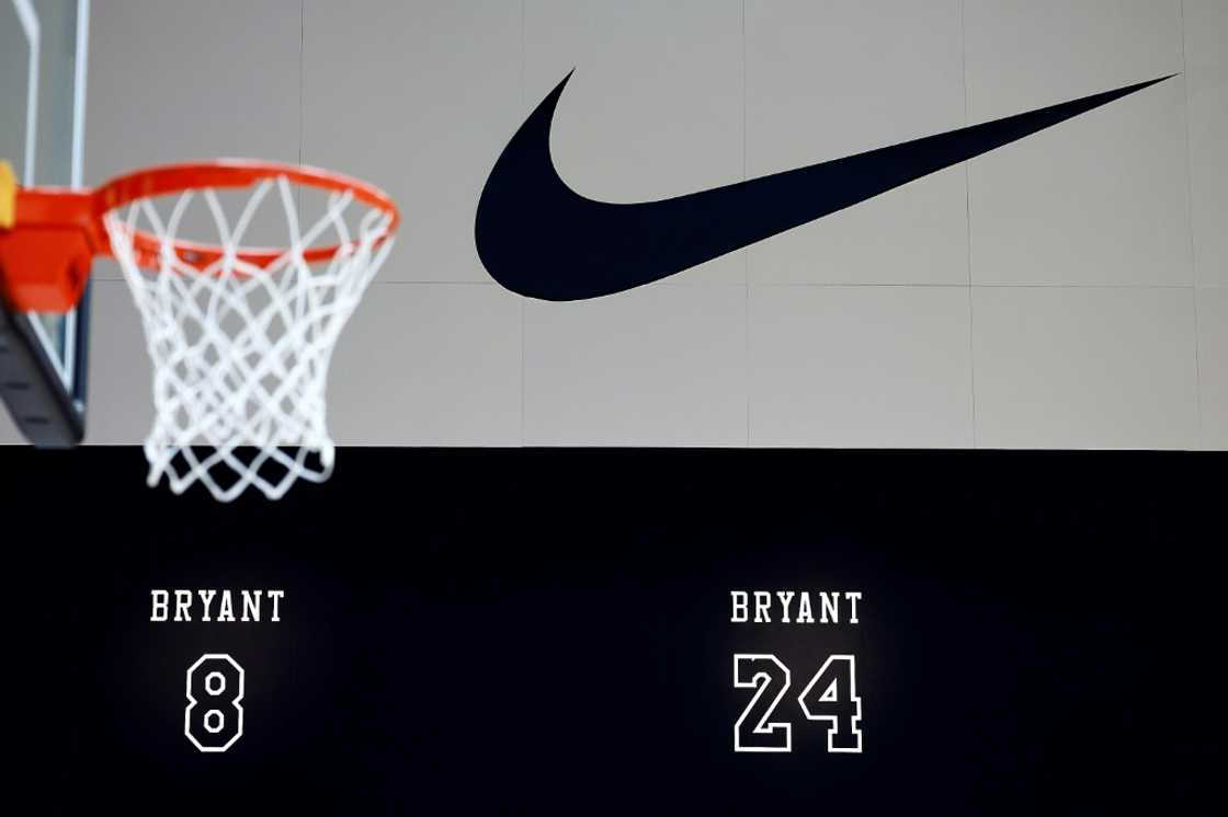 Nike shares fell as it signaled a turnaround from a rocky period would take time