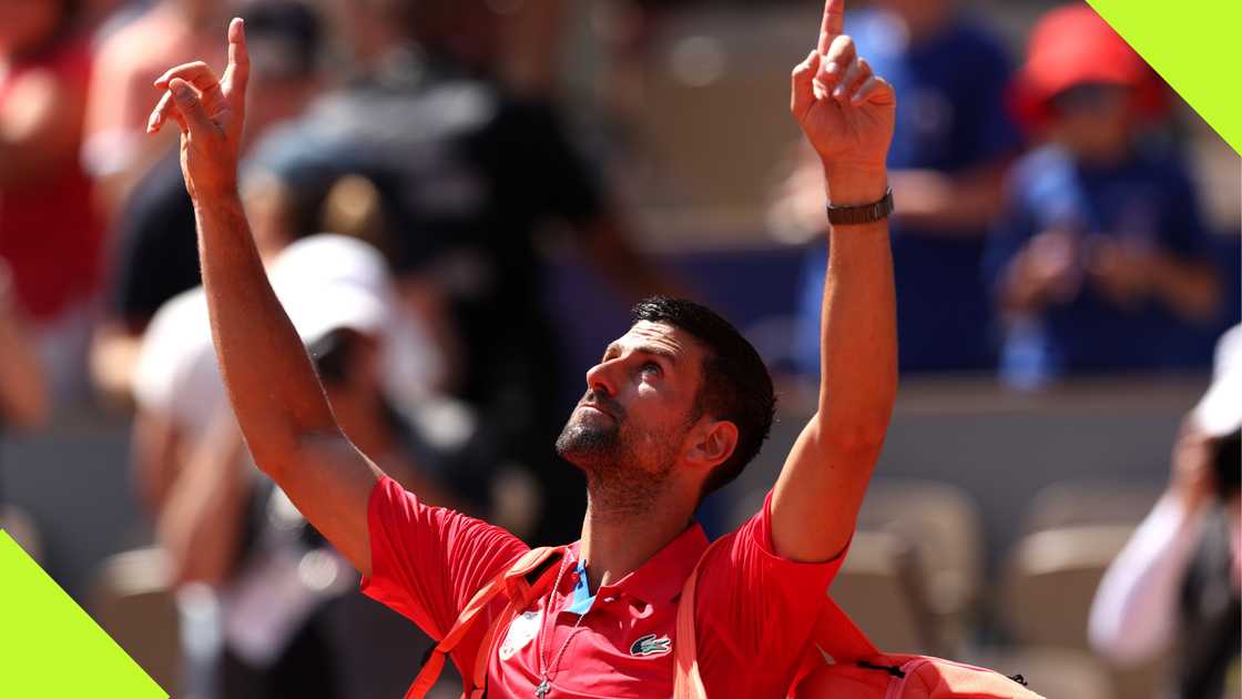 Novak Djokovic appears to thank God after beating Rafael Nadal in straight sets to reach the quarter-finals of the men's singles tennis in the 2024 Olympic Games. Novak Djokovic appears to thank God after beating Rafael Nadal in straight sets to reach the quarter-finals of the men's singles tennis in the 2024 Olympic Games.