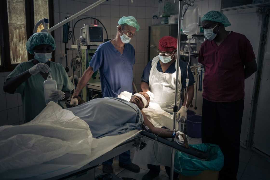 Rebecca Nzengi, 22 and pregnant, receives stitches to her head after being attacked by a 'bandit' with a machete Rebecca Nzengi, 22 and pregnant, receives stitches to her head after being attacked by a 'bandit' with a machete