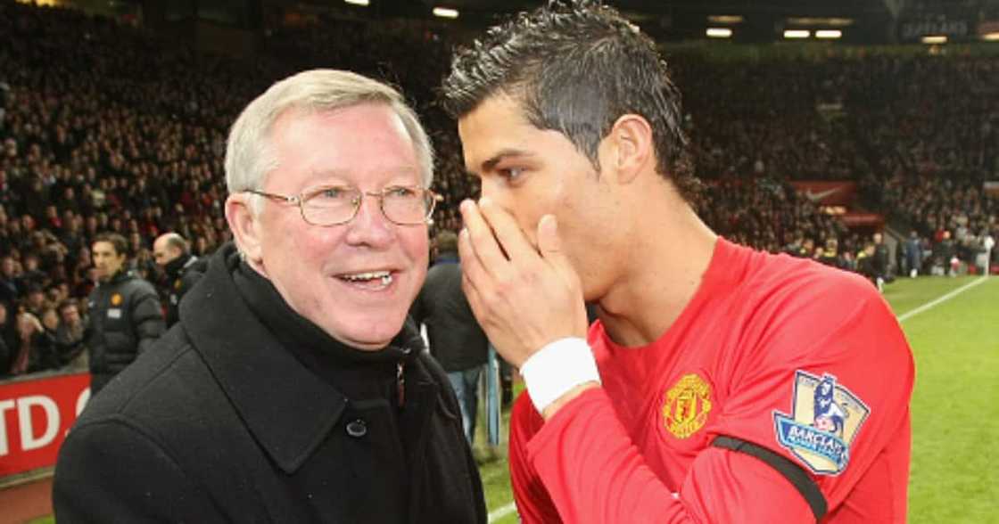 Sir Alex Ferguson of Manchester United presents Cristiano Ronaldo with his FIFA World Player of the Year award ahead.(Photo by John Peters/Manchester United via Getty Images) Sir Alex Ferguson of Manchester United presents Cristiano Ronaldo with his FIFA World Player of the Year award ahead.(Photo by John Peters/Manchester United via Getty Images)