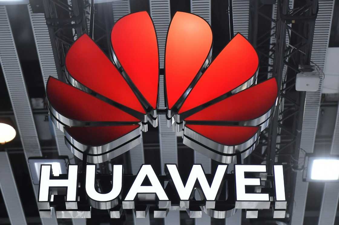 A picture taken on February 28, 2023 shows Chinese manufacturer Huawei logo at the Mobile World Congress (MWC), the telecom industry's biggest annual gathering, in Barcelona. A picture taken on February 28, 2023 shows Chinese manufacturer Huawei logo at the Mobile World Congress (MWC), the telecom industry's biggest annual gathering, in Barcelona.