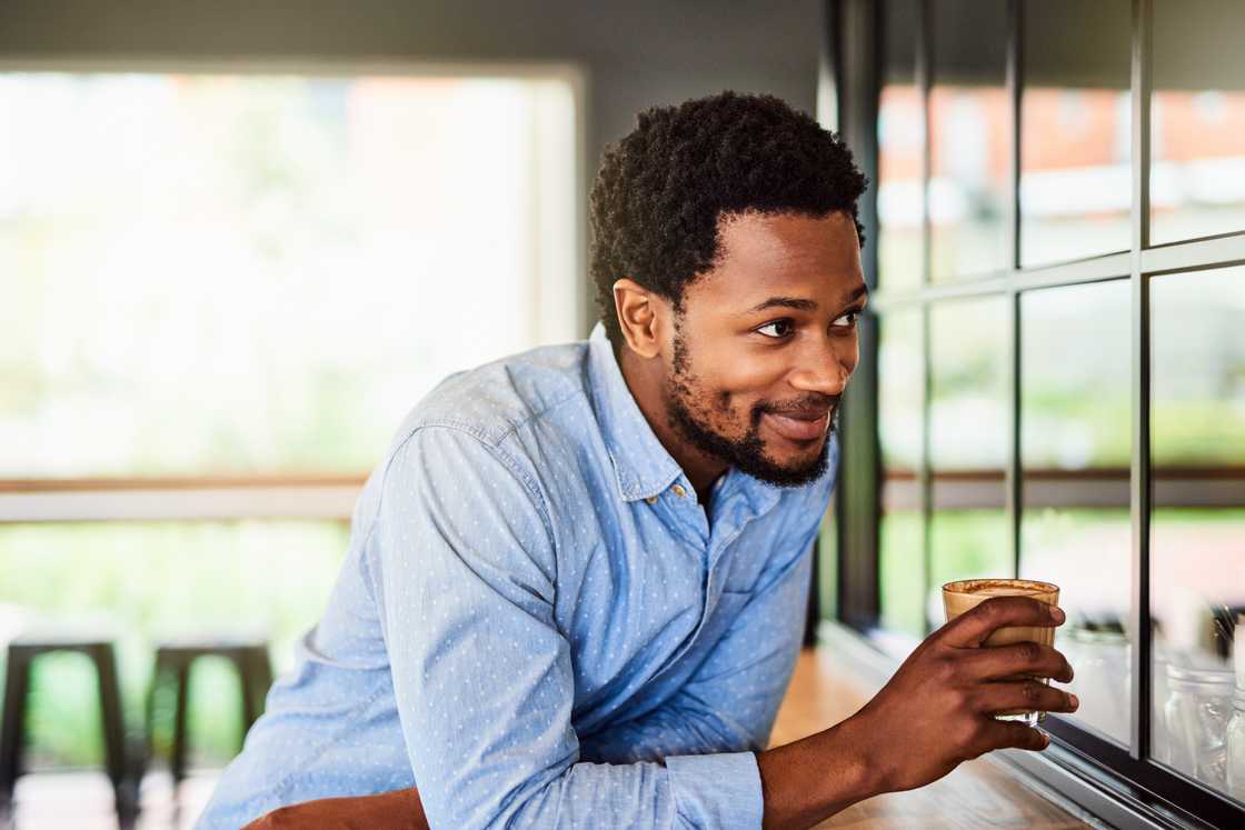 A man at a cafe A man at a cafe