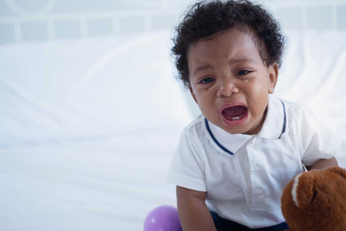 A toddler is crying