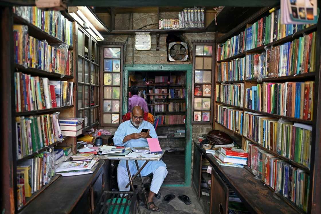 A bookseller waits for customers at an Urdu bazaar in Delhi.