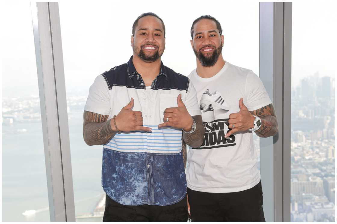 Jimmy Uso (L) and Jey Uso (R)pose for photographs during their visit to One World Observatory in advance of SummerSlam Jimmy Uso (L) and Jey Uso (R)pose for photographs during their visit to One World Observatory in advance of SummerSlam
