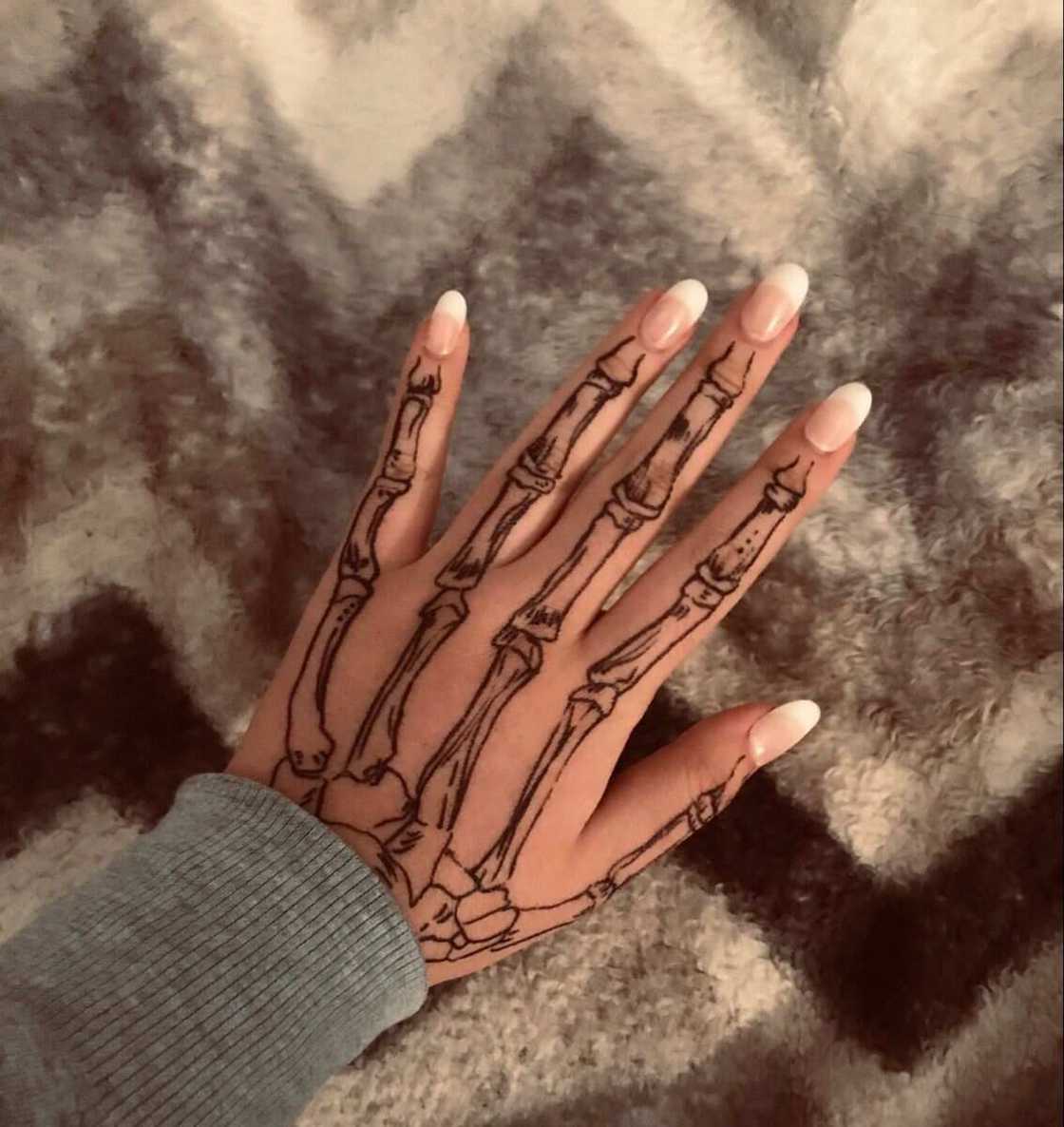 skeleton hand tattoo