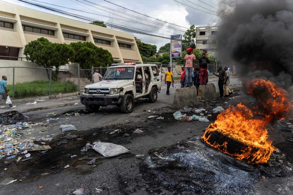 Haitians demonstrate in the capital Port-au-Prince against the possible establishment of an armed international security force in the country, which is spiraling into gang violence Haitians demonstrate in the capital Port-au-Prince against the possible establishment of an armed international security force in the country, which is spiraling into gang violence