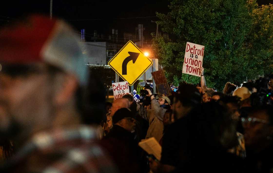 Members of the UAW (United Auto Workers) picket and hold signs outside of the UAW Local 900 headquarters across the street from the Ford Assembly Plant in Wayne, Michigan on September 15, 2023 Members of the UAW (United Auto Workers) picket and hold signs outside of the UAW Local 900 headquarters across the street from the Ford Assembly Plant in Wayne, Michigan on September 15, 2023