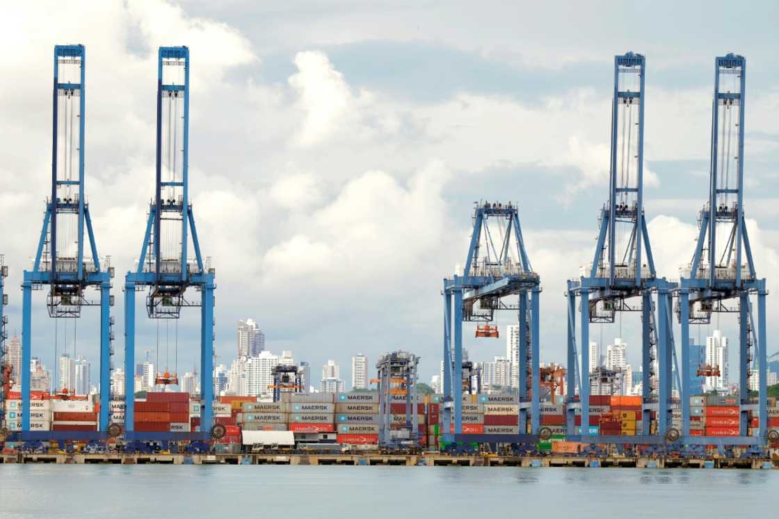 Cranes and containers are seen along the Panama Canal. Hong Kong conglomerate CK Hutchison said it was considering inviting a Chinese "major strategic investor" to join a US-led consortium negotiating the sale of its global ports business, including operations at the Panama Canal