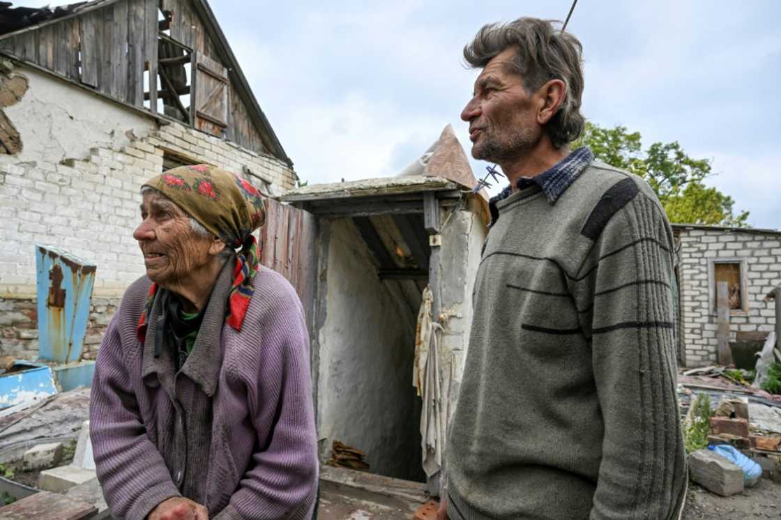 Nina Gonchar and her son Mykola think they are the last residents left in their village Nina Gonchar and her son Mykola think they are the last residents left in their village