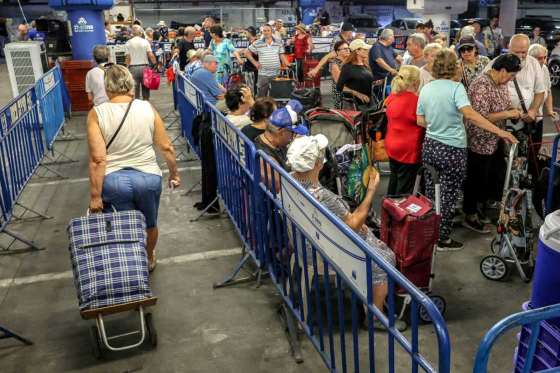 Humanitarian organisations in Israel are already reporting a greater need for their services, with new faces appearing in food distribution queues