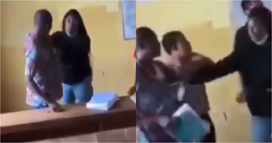 Video emerges as student boldly tears lecturer's shirt as she fights him for stopping her from writing exams Video emerges as student boldly tears lecturer's shirt as she fights him for stopping her from writing exams