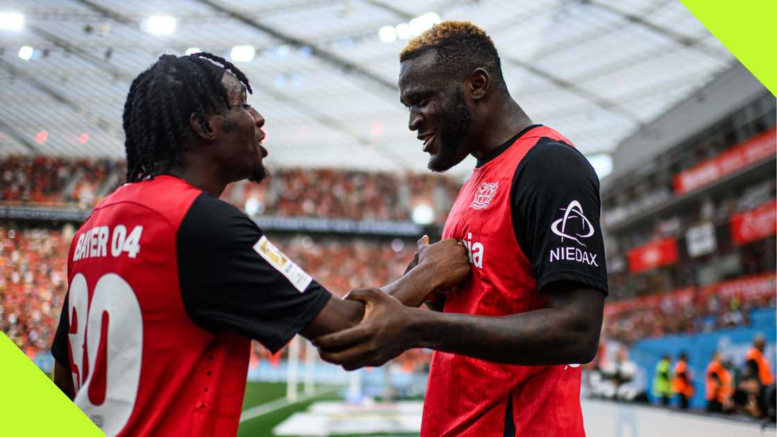 Victor Boniface and Jeremie Frimpong celebrate Bayer Leverkusen's late win over VfL Wolfsburg. Victor Boniface and Jeremie Frimpong celebrate Bayer Leverkusen's late win over VfL Wolfsburg.