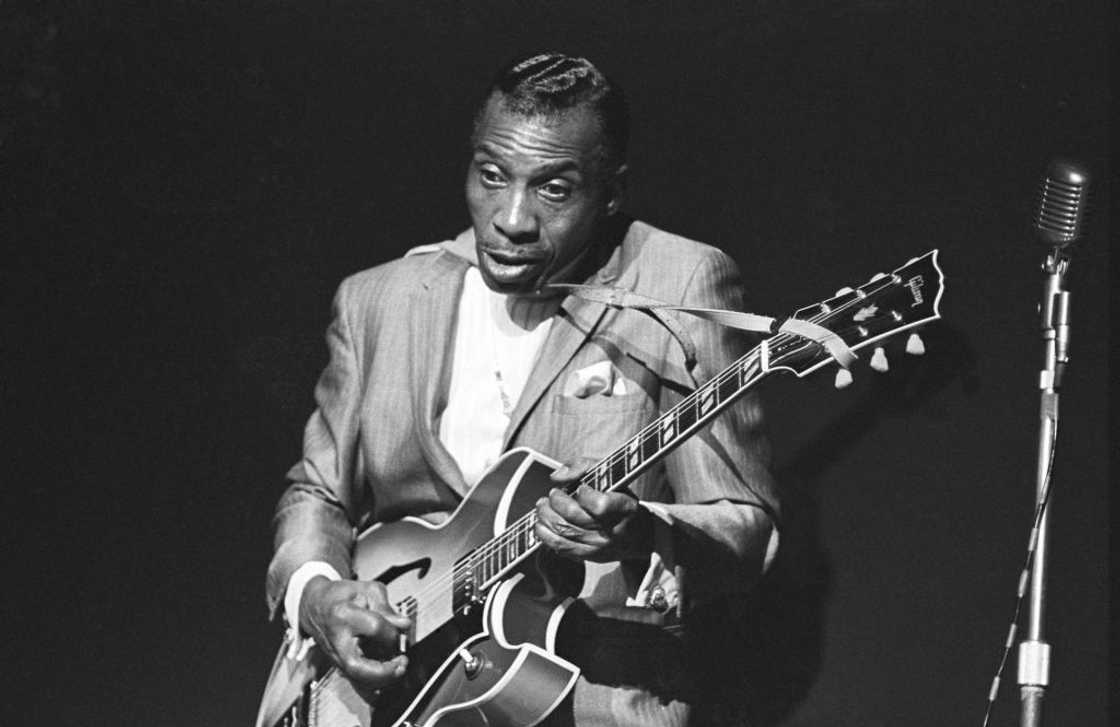 American blues guitarist singer and songwriter T-Bone Walker performing in Copenhagen, Denmark. American blues guitarist singer and songwriter T-Bone Walker performing in Copenhagen, Denmark.