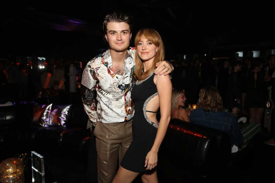 Joe Keery and Maika Monroe at a premiere Joe Keery and Maika Monroe at a premiere