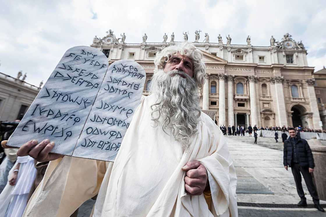 A man dressed as Moses with the Ten Commandments attends a Weekly General Audience in St. Peter's Square in Vatican City, Vatican. A man dressed as Moses with the Ten Commandments attends a Weekly General Audience in St. Peter's Square in Vatican City, Vatican.